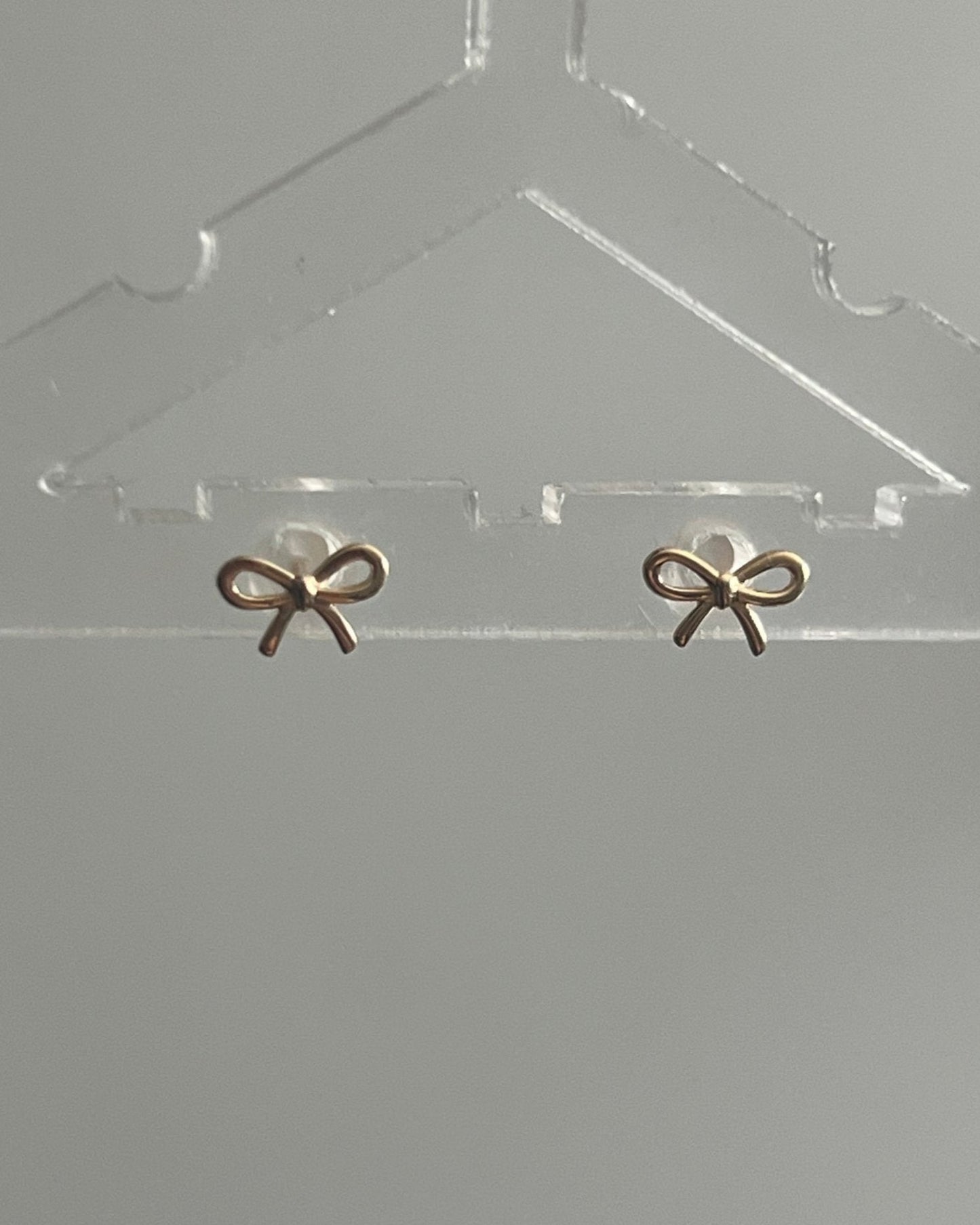 14k gold bow studs - gldn grl