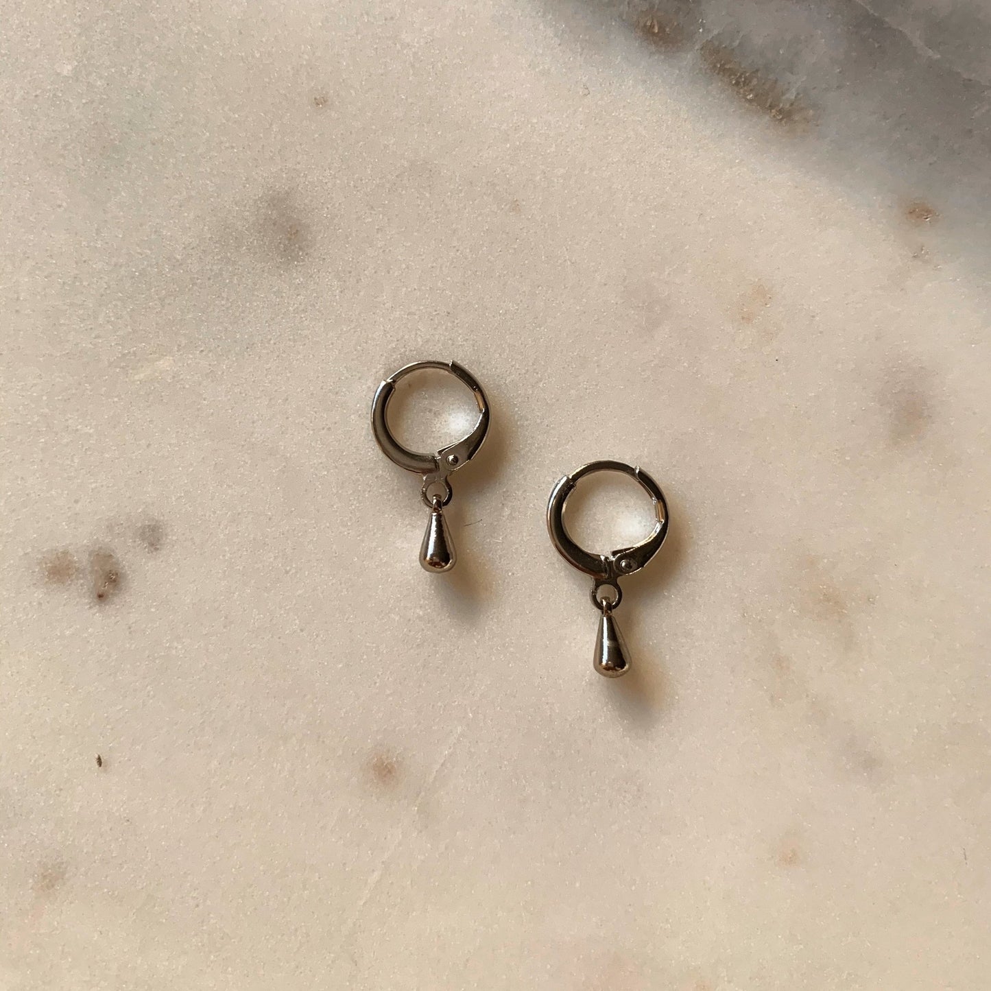 gldn grl courage hoops in rhodium