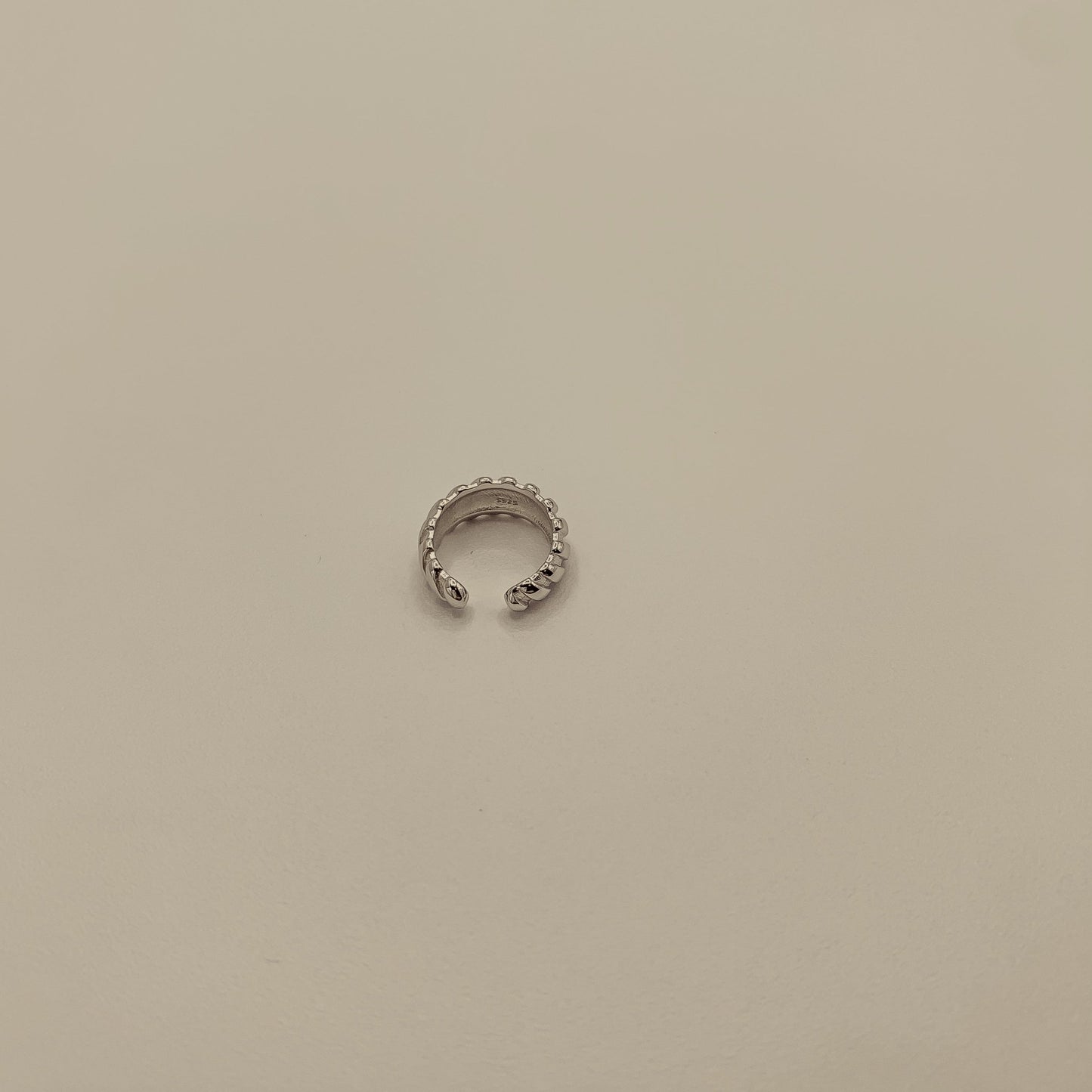 silver growth ear cuff in croissant