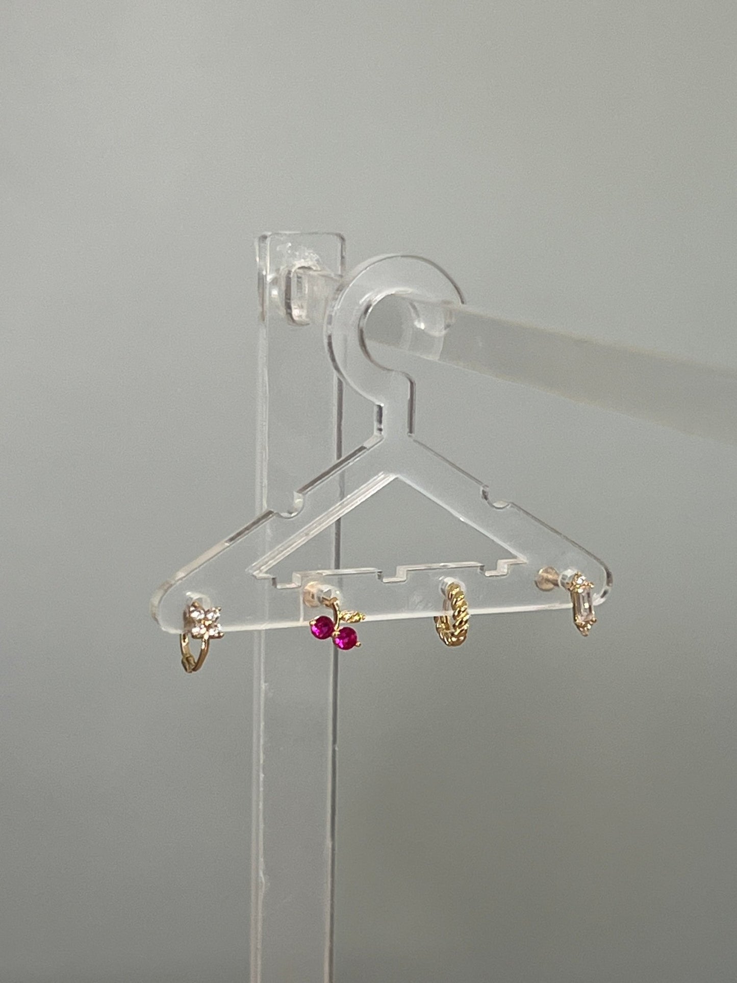 
                  
                    14k CZ stud - gldn grl
                  
                