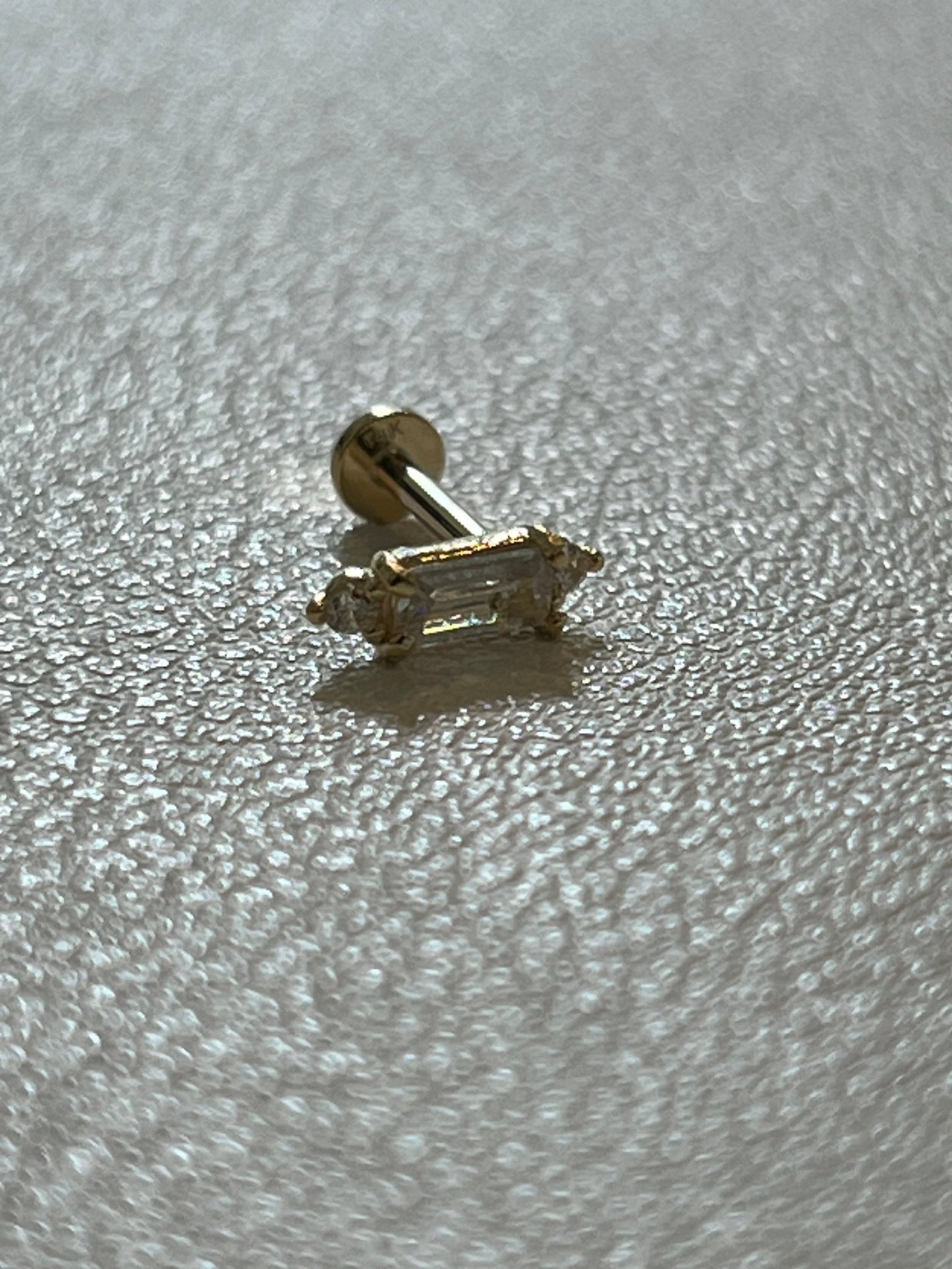 
                  
                    14k CZ stud - gldn grl
                  
                