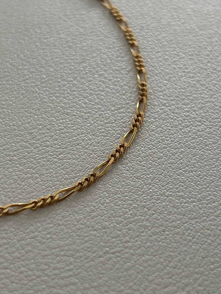 
                  
                    14k figaro bracelet - gldn grl
                  
                