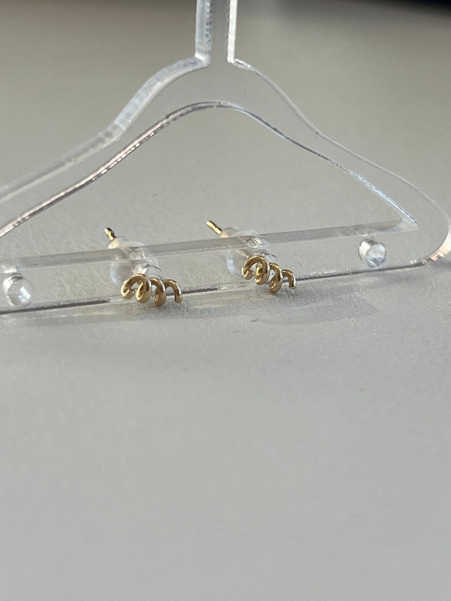 
                  
                    14k spring studs - gldn grl
                  
                