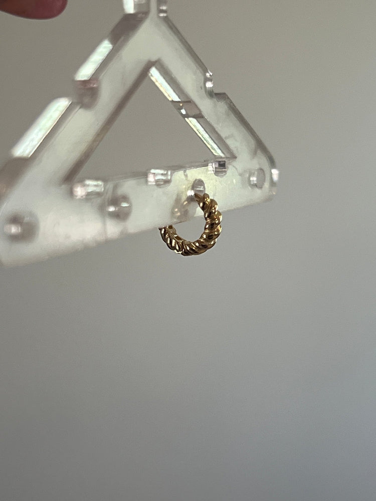 
                  
                    14k twisted hoop - gldn grl
                  
                