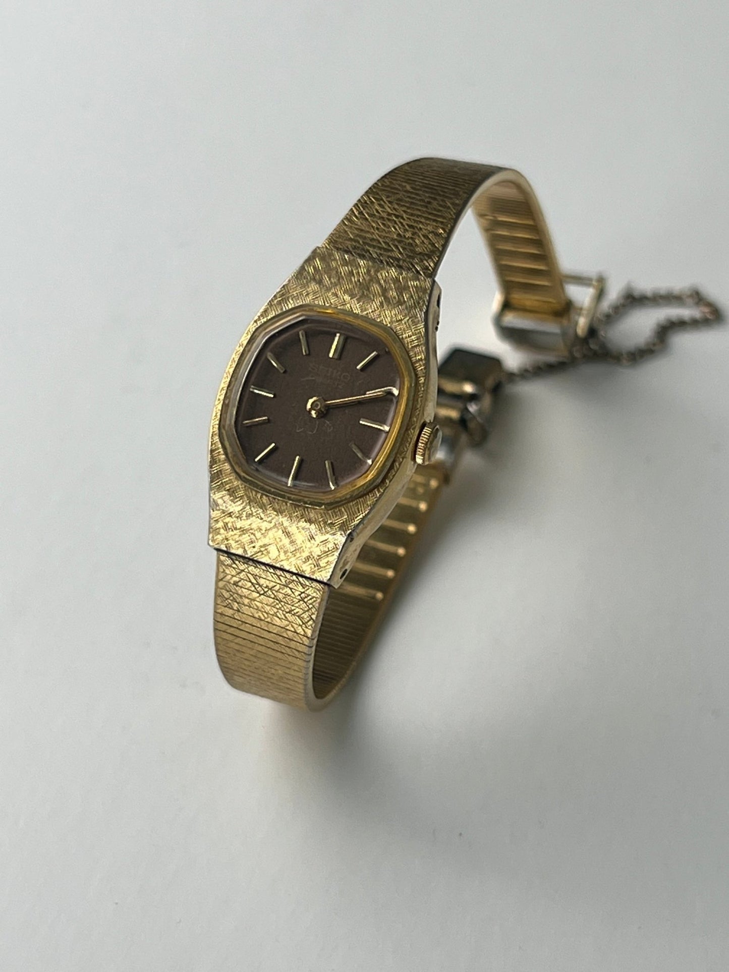
                  
                    Brown Octagonal Seiko - gldn grl
                  
                