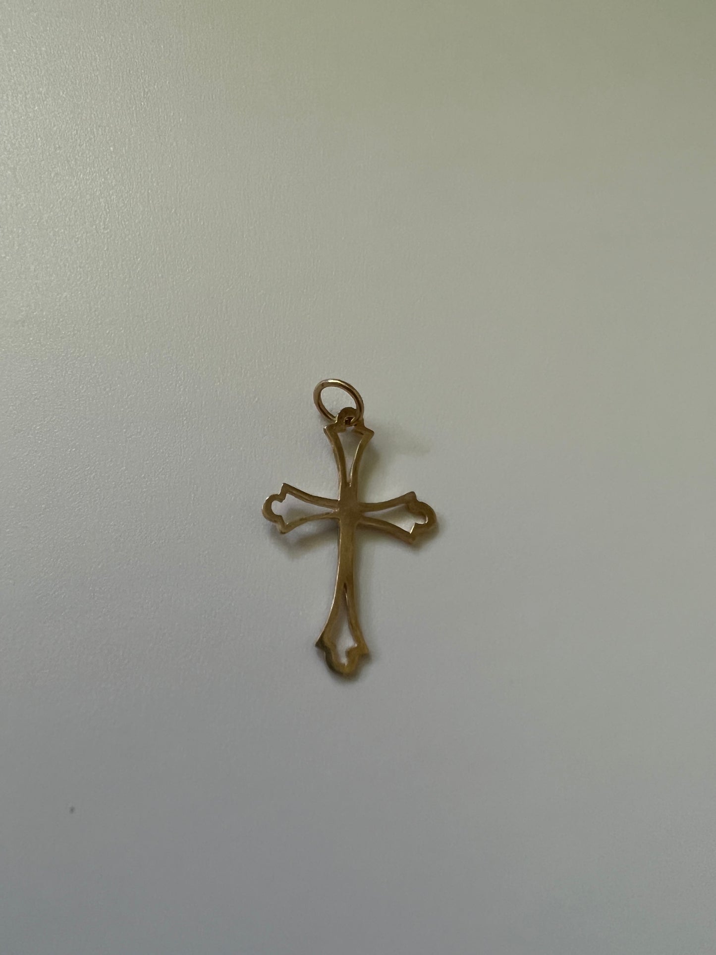 
                  
                    10k decorative cross pendant
                  
                