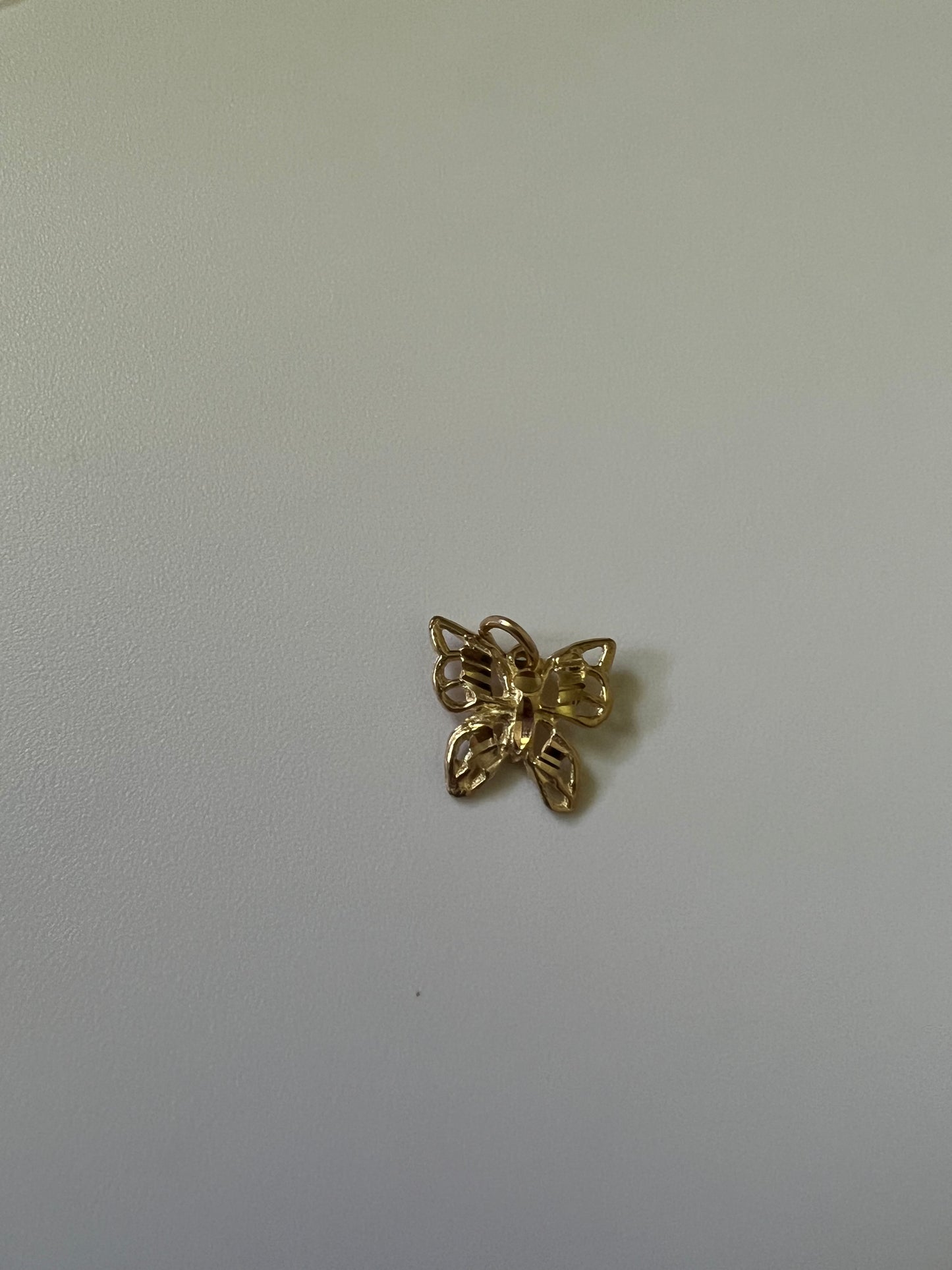 
                  
                    10k butterfly pendant
                  
                
