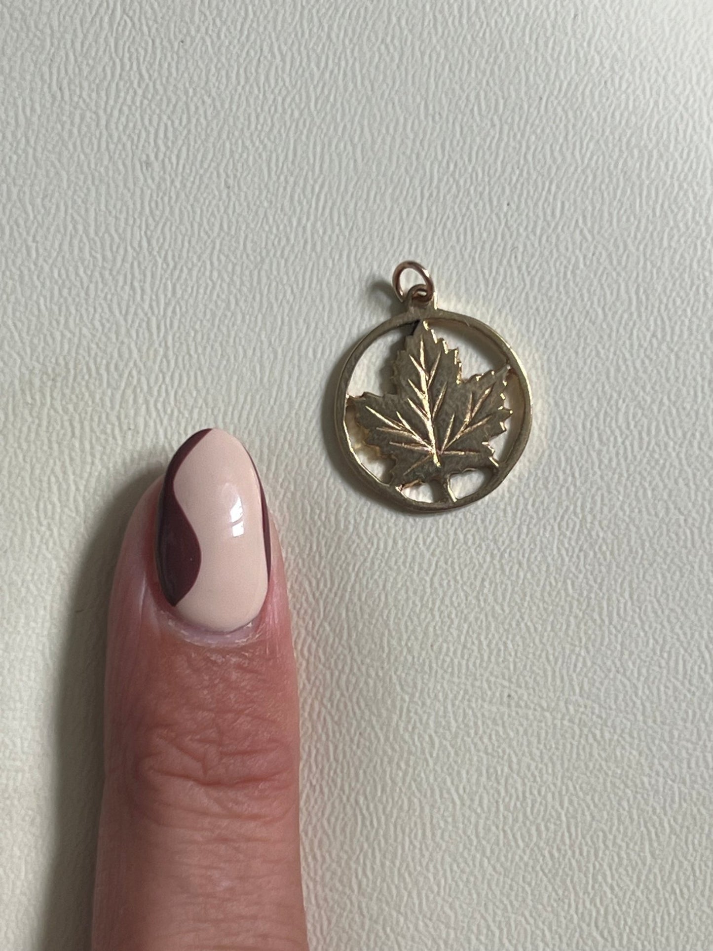 
                  
                    Maple leaf pendant - gldn grl
                  
                