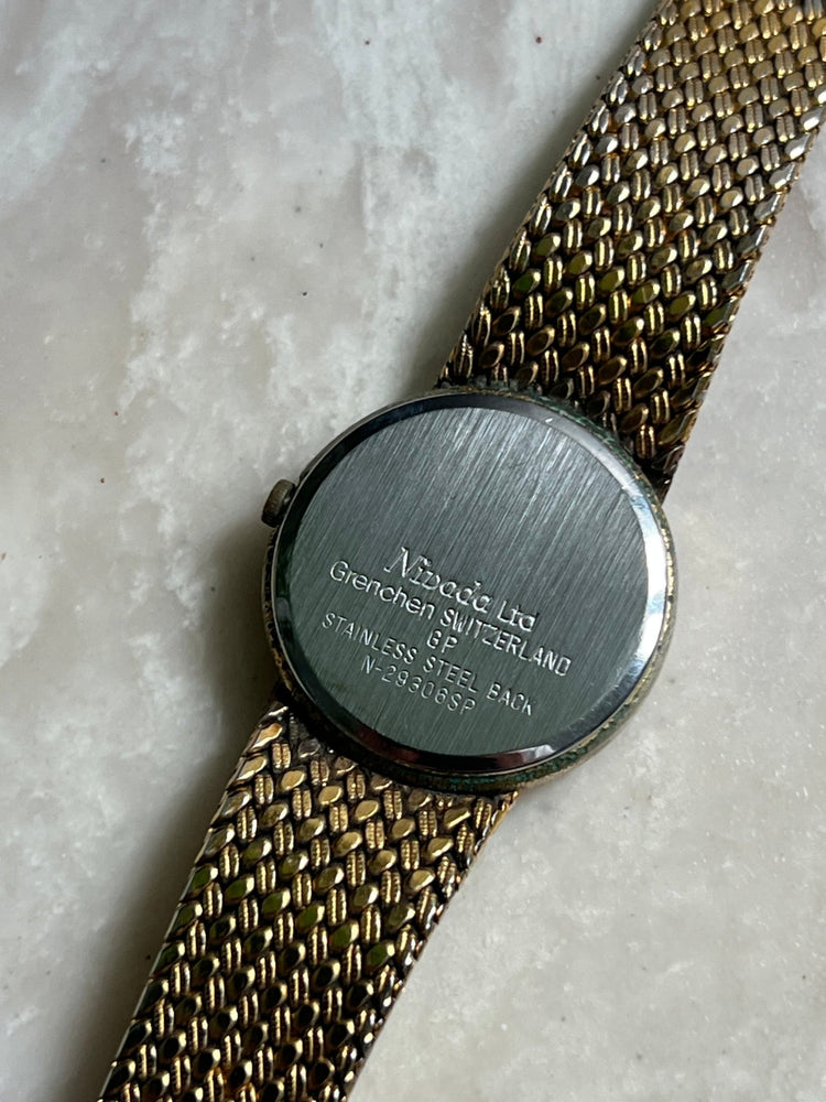 
                  
                    Nivada Swiss Watch - gldn grl
                  
                