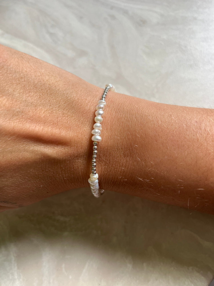 
                  
                    Silver and pearl braclet - gldn grl
                  
                