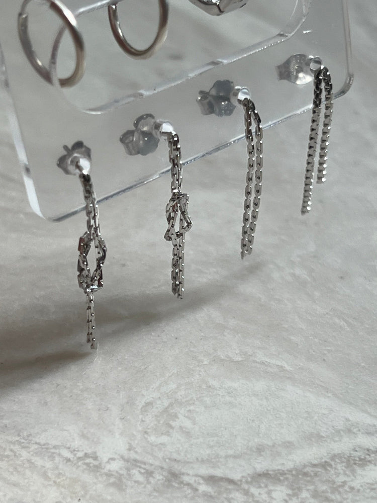 
                  
                    Silver dangling studs - gldn grl
                  
                