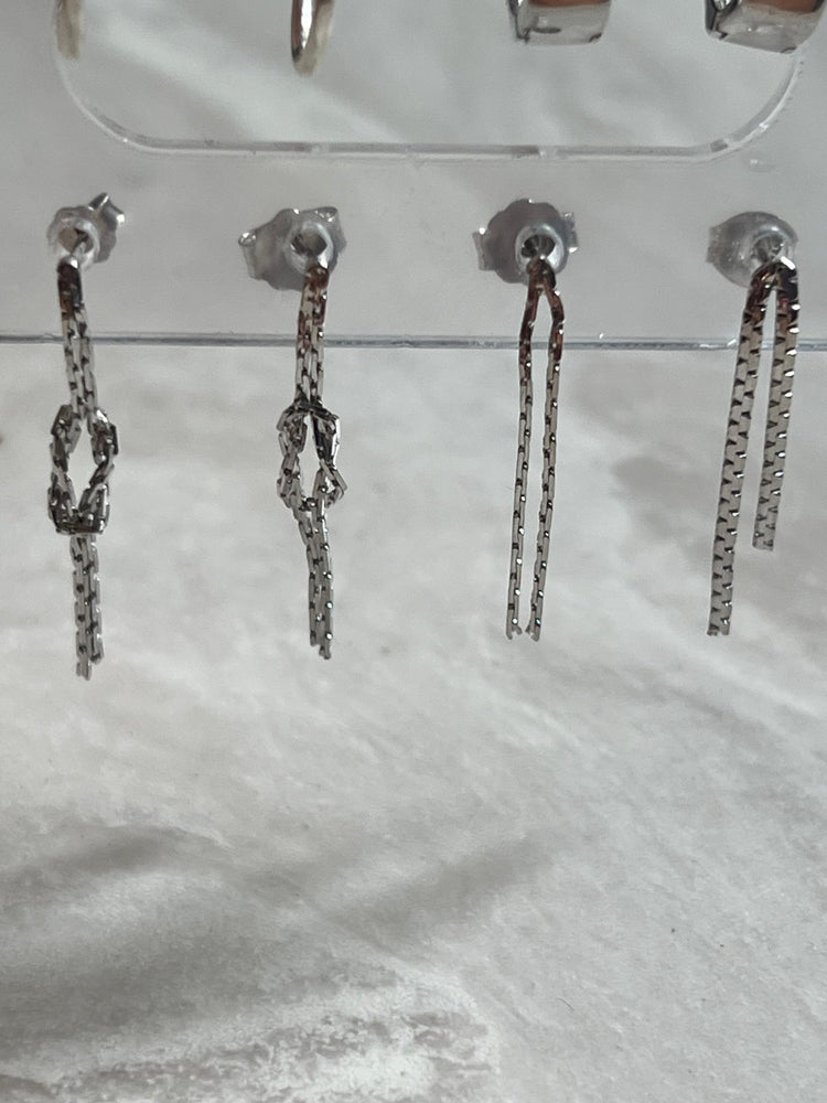 
                  
                    Silver dangling studs - gldn grl
                  
                