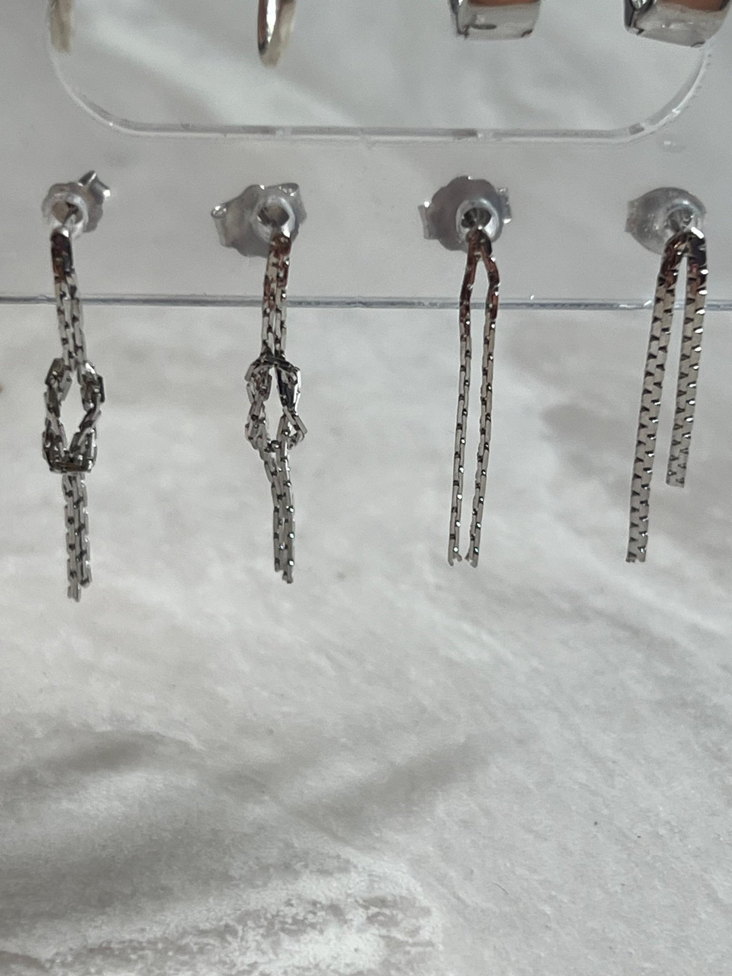 
                  
                    Silver dangling studs - gldn grl
                  
                