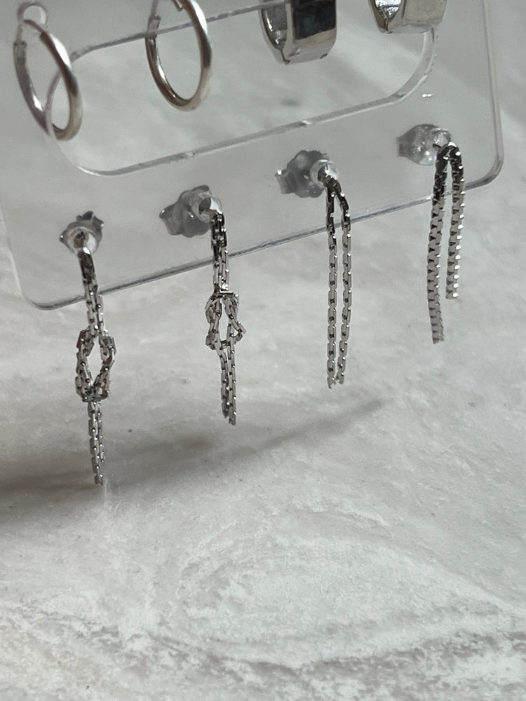 
                  
                    Silver dangling studs - gldn grl
                  
                