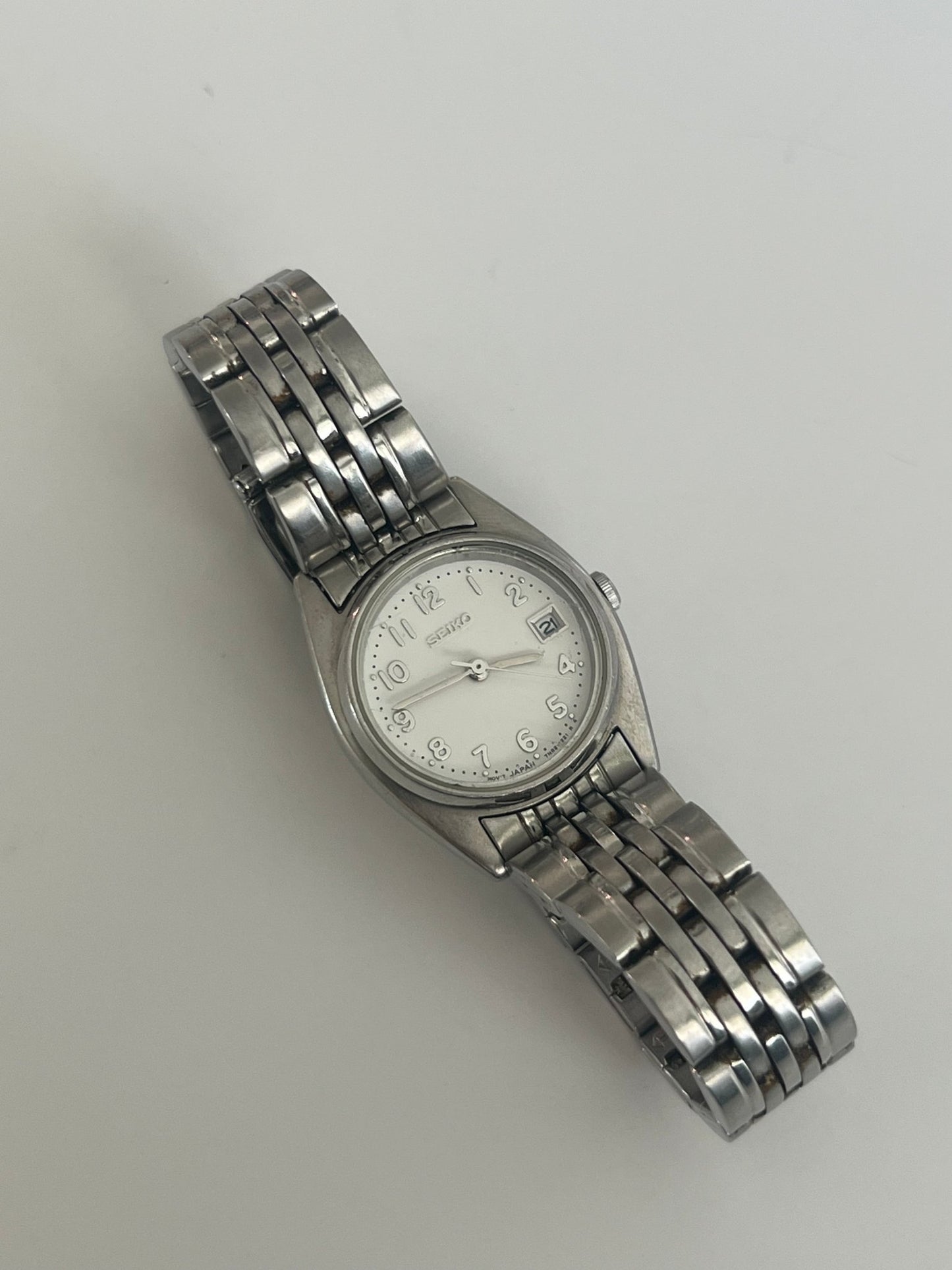 
                  
                    Silver Seiko watch - gldn grl
                  
                