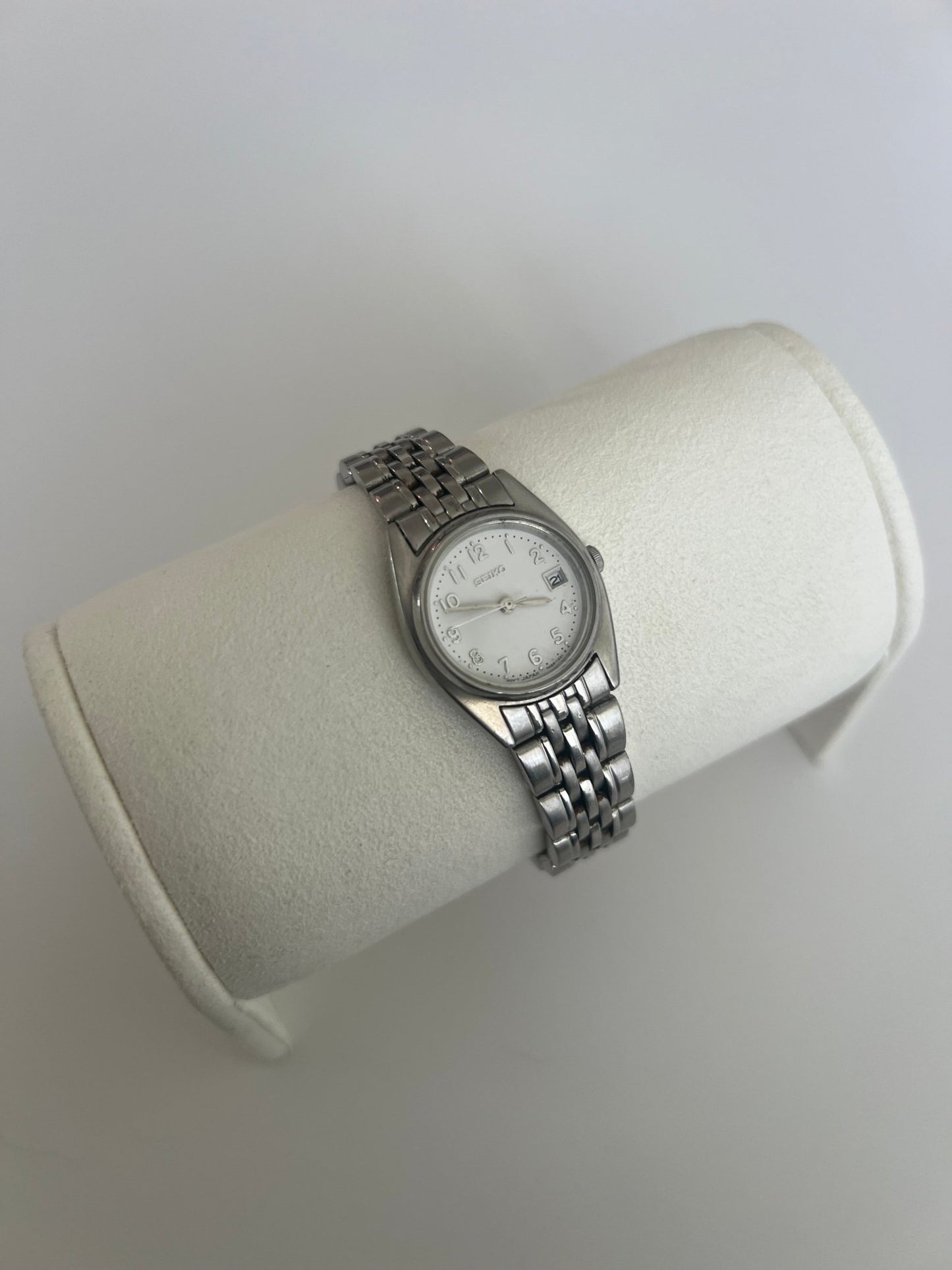 
                  
                    Silver Seiko watch - gldn grl
                  
                