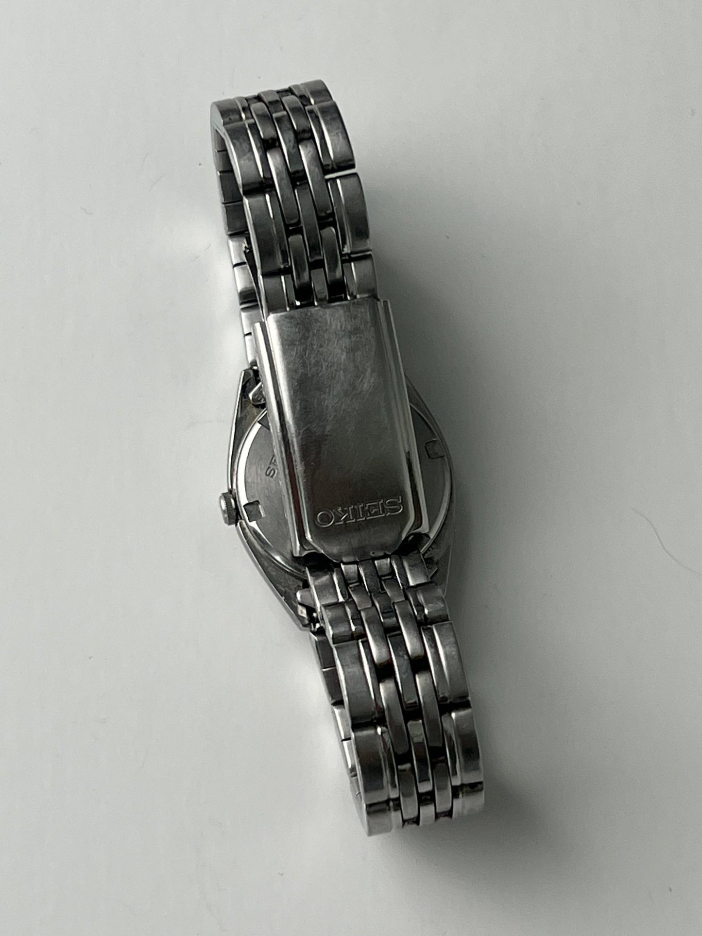 
                  
                    Silver Seiko watch - gldn grl
                  
                