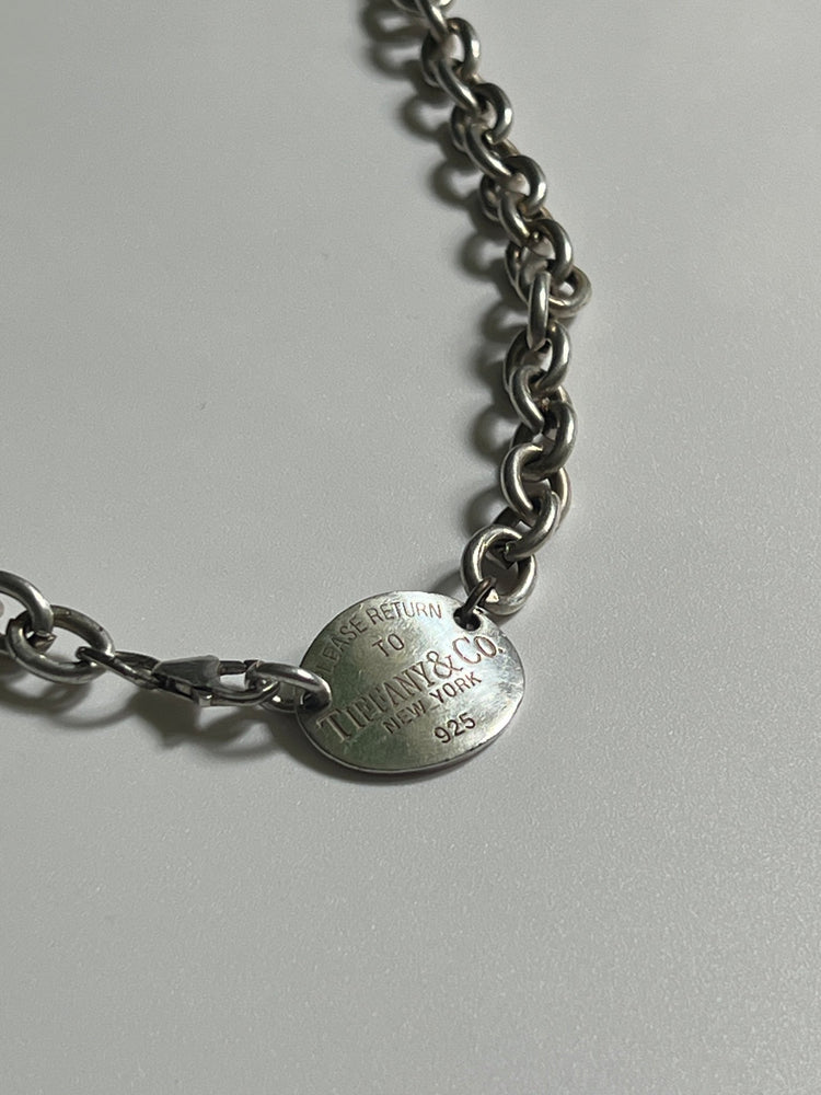 
                  
                    Tiffany and Co. oval disc choker - gldn grl
                  
                