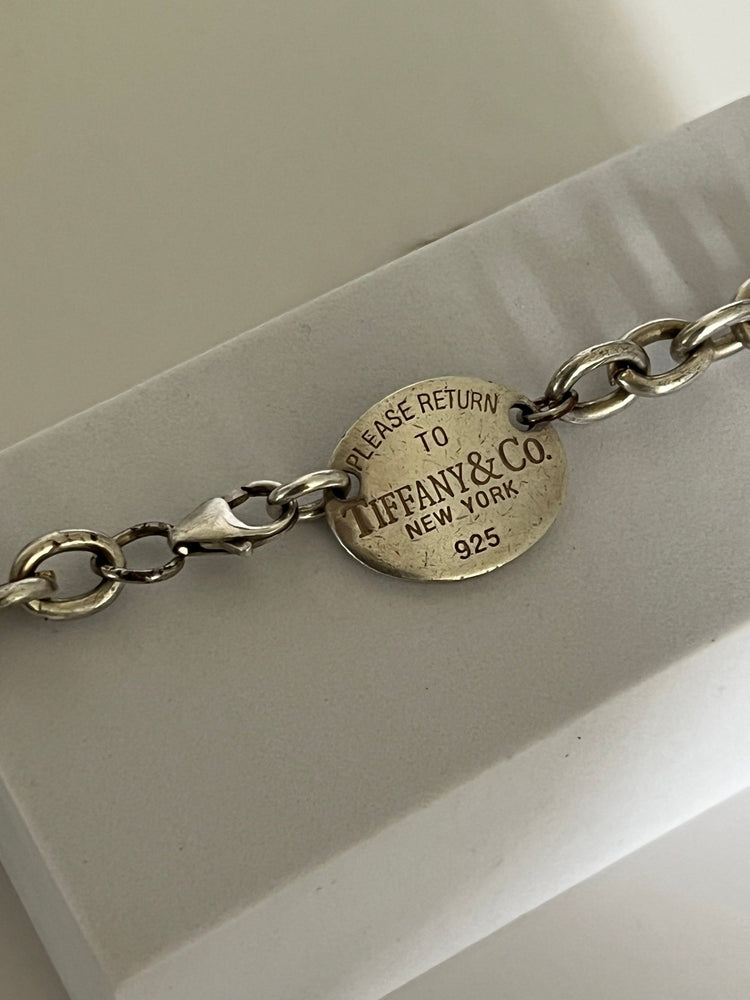 
                  
                    Tiffany and Co. oval disc choker - gldn grl
                  
                