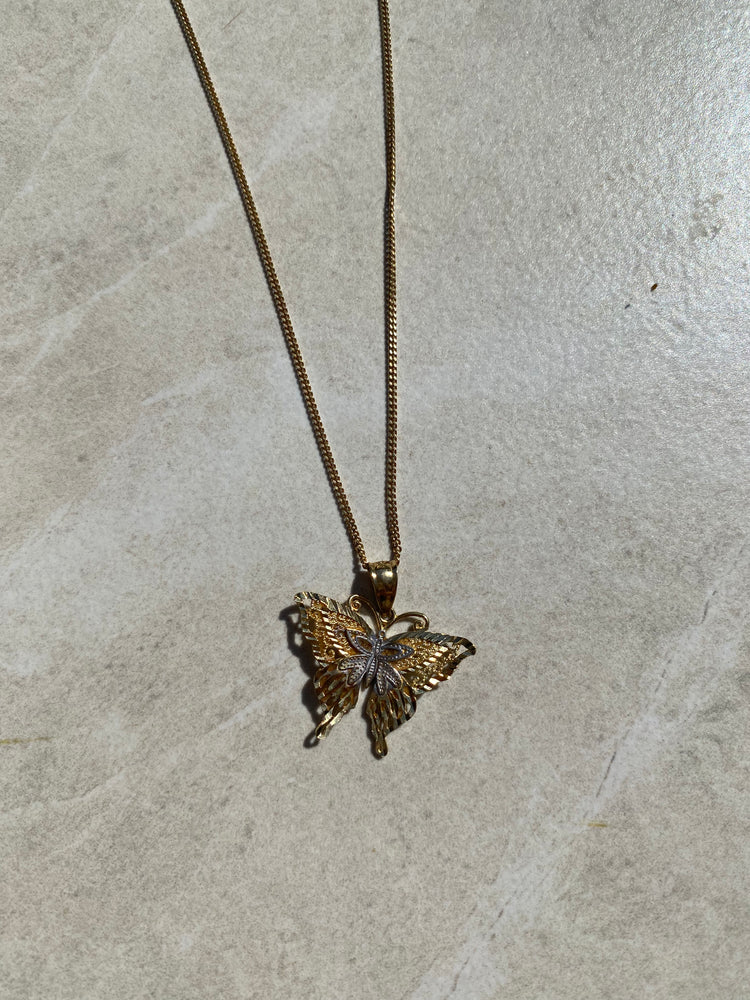 
                  
                    10k butterfly pendant
                  
                
