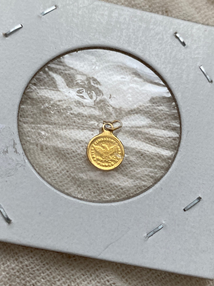 
                  
                    22k gold coin charm
                  
                