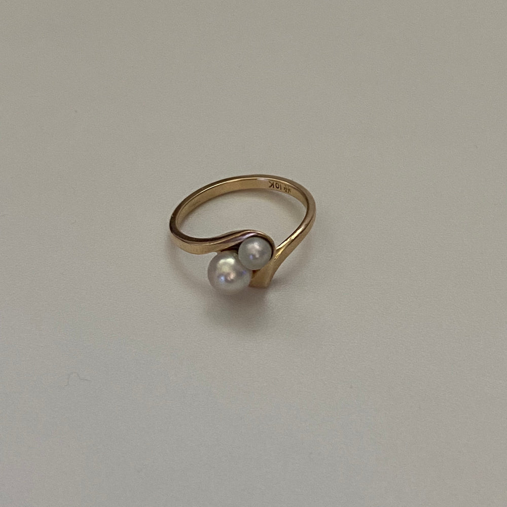 
                  
                    antique dual pearl ring
                  
                