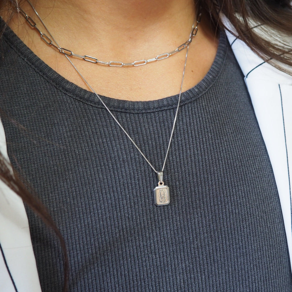 
                  
                    rhodium mother necklace on
                  
                